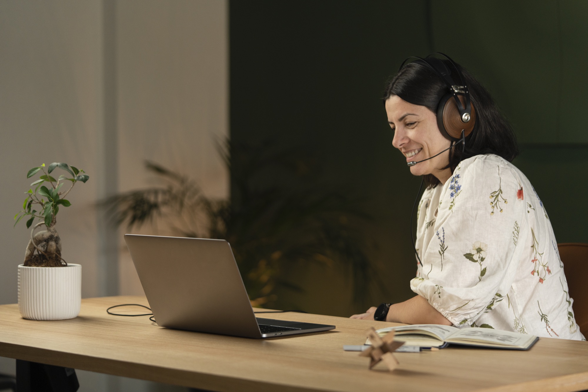 Photo of remote worker using boom mic cable