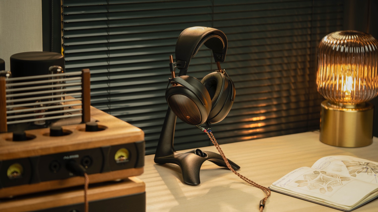 Photo of Meze Audio Liric on headphone stand on desk