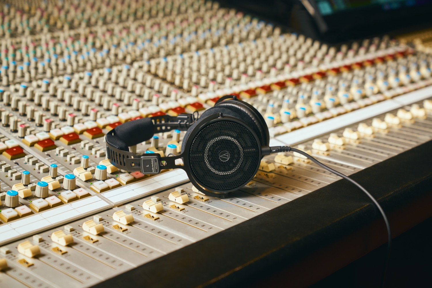 Photo of ATH-R50x on mixing console